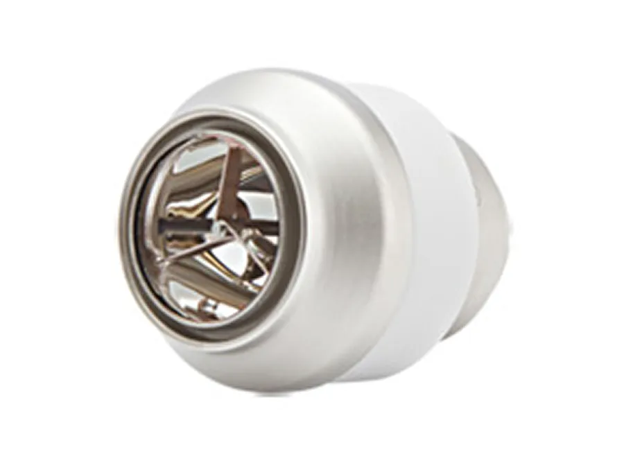 Close-up of a metallic jet nozzle with a circular vent and internal vanes, typically used for directing water flow in a spa or hot tub.